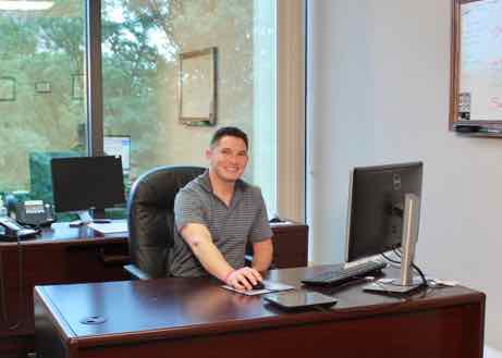 person at desk in office