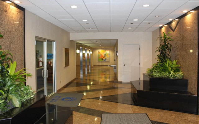 A woman working in an office rental in Independence, OH.